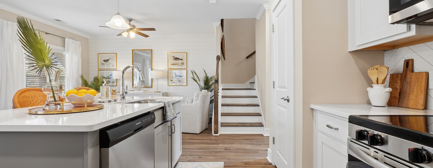 a kitchen with white cabinets